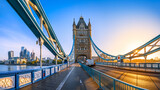 Fototapeta Londyn - the famous tower bridge of london during sunrise