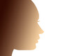 silhouette of a young woman's head in profile, with gradient of warm skin tones, as a concept of feminism, equality and women empowerment, against machismo and violence