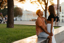  Romantic Hispanic Couple Hugging And Enjoying The Sunset In The City