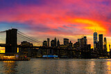 Fototapeta  - Brooklyn Bridge and Manhattan at sunset