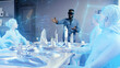 © Framestock - A man wearing vr glasses in the cyberspace of the meta universe at an online meeting, discussing a holographic 3D architectural design of a futuristic sustainable city of the future.
