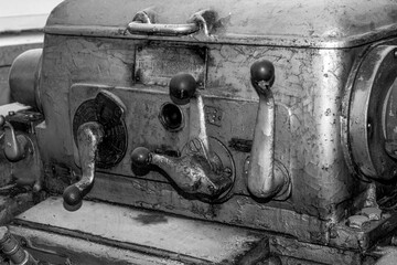 Wall Mural -  Metalworking workshop, metal processing machines.  Vintage Industrial Machinery in a old factory - black and white photo