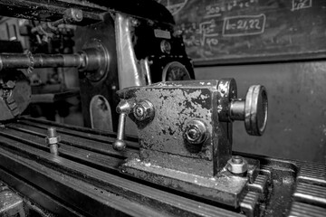 Wall Mural -  Metalworking workshop, metal processing machines.  Vintage Industrial Machinery in a old factory - black and white photo