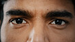 © Yuliia - Extreme close up face of young arabian male adult model man male eyes with dark eyeballs stare looking at camera show good healthy vision perfect eyesight after renewal medical ophthalmology procedure