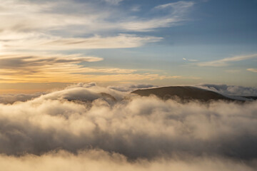 Wall Mural - Snowdonia Rhinogydd mountains sunrise aerial view with low cloud inversion weather