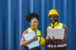© Quality Stock Arts - African teen black woman staff worker teamwork man and woman team work in port cargo industry happy smile