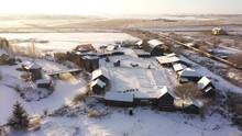 Wooden Home In Village In Winter Season. Aerial View