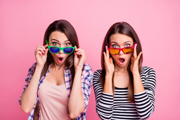 Sticker - Photo of astonished wondered people arms touch glasses cant believe isolated on pink color background