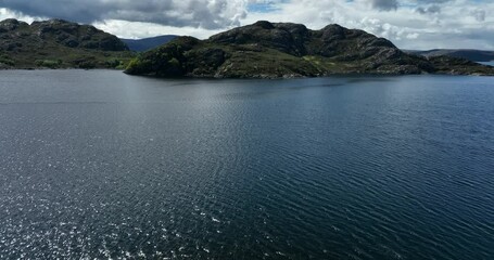 Wall Mural - Aerial view of the landscape surrounding Diabaig, Lower Diabaig and Torridon village in the north west highlands of Scotland during summer on a blue sky day with light clouds