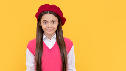 Poster - tween and youth concept. casual fashion. happy french teen girl on yellow background.