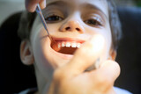 Fototapeta Do akwarium - Little Boy is Having His Tooth Check Up at Dentist