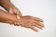 © Sanhanat - Closeup elderly hands  massage painful wrist. Concept : health problem. Senior healthcare.  Massage for relieve of  hurt or painful. Wrist symptomatic.