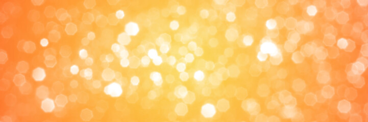 Wall Mural - Summer orange sparkling glitter bokeh background, banner texture. Abstract defocused lights header. Wide screen wallpaper. Panoramic web banner with copy space for design