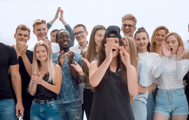 Wall Mural - close up. a group of young people applauding their victory