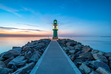 Wall Mural - lighthouse molenfeuer westmole at dusk, warnemünde, rostock, mecklenburg-vorpommern, germany