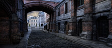 Old Victorian City Street Archway And Cobblestones. Steampunk Concept Urban Panoramic 3D Illustration.