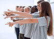 © ASDF - business people shaking hands at a work meeting