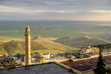 Wall Mural - Artuklu Mardin, Turkey 7 May 2022 Mardin landscape at sunset with minaret of Ulu Cami, also known as Great mosque of Mardin