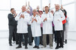 © ASDF - doctors and a group of mature people applaud