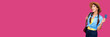 © khmelev - Smiling caucasian woman holding credit card isolated on pink background. Online shopping, e-commerce, internet banking, spending money, enjoying life concepts