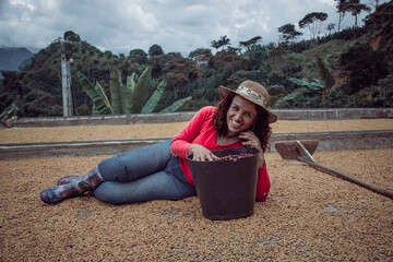 Wall Mural - Woman in her coffee farm in the country of Colombia