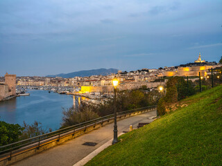 Wall Mural - City of Marseille illuminated at dusk in the South of France