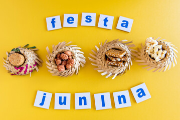 Brazilian Festa Junina Party sweets, straw hat, popcorn, paçoca and sweet peanuts.