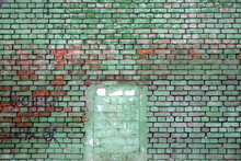 Background Of A Brick Wall Painted With Green Paint