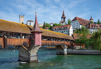 Wall Mural - View of  wooden pedestrian bridge and old town in  Lucerne, Switzerland.