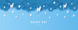 Paper cut of rainy day text with clouds, rain drops and lightning on blue background, copy space. Vector illustration