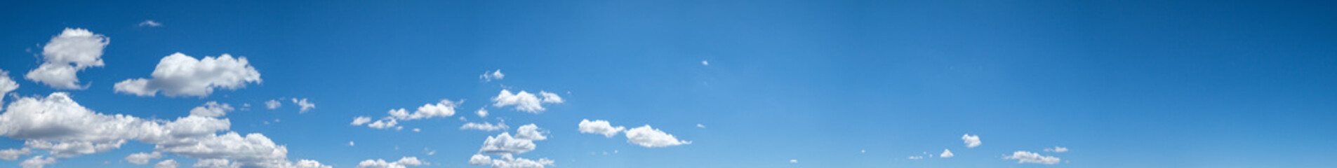 Canvas Print - white clouds in blue summer sky panoramic background