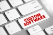 Custom Software is software that is specially developed for some specific organization or other user, text concept button on keyboard