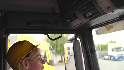 Wall Mural - Middle age truck driver woman, trucker occupation in Europe for females