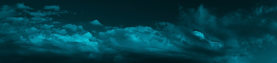 Wall Mural - night sky with clouds. dark dramatic sky background with space for design. web banner. wide. panoram