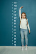 © millaf - Child measure height