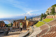 View of Etna Mount from Taormina teatro greco on sunny day, Sicily, Italy