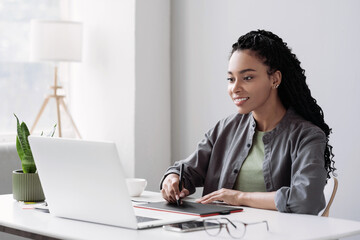 Sticker - Young woman using laptop computer at office, Student girl working at home, Work or study from home, freelance, business, lifestyle concept