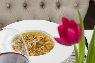 Tortellini, italian pasta stuffed with a mix of meat, parmigiano cheese and served in capon broth. Close-up.