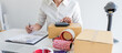 © Freedomz - Young entrepreneur SME receive order client and working with packaging sort box delivery online market on purchase order and preparing package product, Small business parcel for shipment