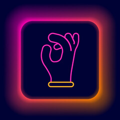 Poster - Glowing neon line Medical rubber gloves icon isolated on black background. Protective rubber gloves. Colorful outline concept. Vector