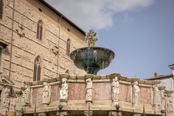 Wall Mural - Detail of the ancient medieval marble made main fountain of Perugia (Umbria Region, central Italy).  Masterpiece of medieval sculpture, it is the symbol of the city.