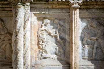 Wall Mural - Detail of the ancient medieval marble made main fountain of Perugia (Umbria Region, central Italy).  Masterpiece of medieval sculpture, it is the symbol of the city.