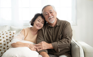 Asian senior couple smiling at the camera. Family mature couple portrait