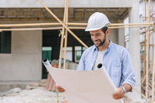 Engineer Builder Architect Enjoy Working Looking Floor Plan In Home Construction Site Happy Smile.