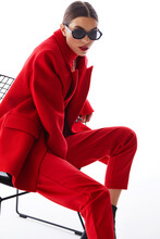 Fashion Woman In Trendy Red Outfit.
