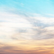 © flowertiare - sunset background. sky with soft and blur pastel colored clouds. gradient cloud on the beach resort. nature. sunrise.  peaceful morning. Instagram toned style