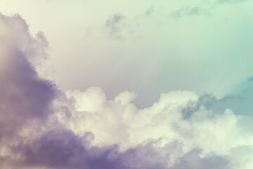 Wall Mural - twilight sky with effect of light pastel turquoise colors. colorful sunset of soft clouds.