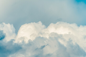 Wall Mural - twilight sky with effect of light pastel turquoise colors. colorful sunset of soft clouds.