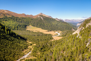 Wall Mural - View on the Swiss National Parc from the top of the Fuorn or Ofen Pass (Pass dal Fuorn). It connects Zernez in the Engadin Valley with Val Müstair. The name is based on ovens they used in the area.