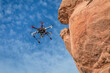 © MarekPhotoDesign.com - home made hexacopter drone flying with a small camera along sandstone canyon cliff
